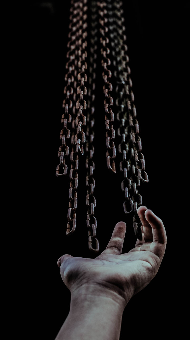 hand-with-chain hand with chain